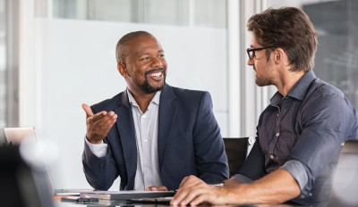 Procuement-image-2 Staff members talking