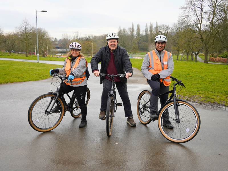 Councillor Hawkins with staff and bikes